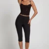 Armelia Μπλούζα με διακοσμημένο λαιμόκοψη Peekaboo σε μαύρο