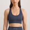 Αθλητικό σουτιέν FlexiRib με πλάτη Racerback σε χρώμα Indigo Slate Αθλητικό σουτιέν FlexiRib με πλάτη Racerback σε χρώμα Indigo Slate