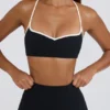 Αθλητικό σουτιέν Soft Active με λαιμόκοψη σε μαύρο χρώμα Αθλητικό σουτιέν Soft Active με λαιμόκοψη σε μαύρο χρώμα