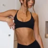 Αθλητικό σουτιέν Soft Active με πλάτη τύπου racerback σε μαύρο