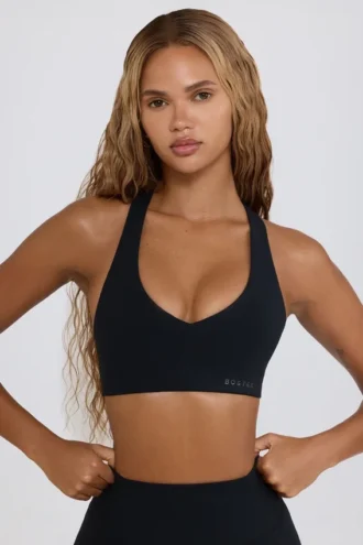 Αθλητικό σουτιέν Soft Active με V-neck σε μαύρο χρώμα