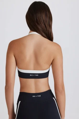 Αθλητικό σουτιέν Soft Active Twist-Front με λαιμόκοψη σε μαύρο