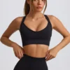 Αθλητικό σουτιέν Super Sculpt χωρίς ραφές με σταυρωτές τιράντες σε μαύρο χρώμα Αθλητικό σουτιέν Super Sculpt χωρίς ραφές με σταυρωτές τιράντες σε μαύρο χρώμα
