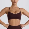 Αθλητικό σουτιέν Super Sculpt χωρίς ραφές με σταυρωτή πλάτη σε χρώμα σοκολάτα Αθλητικό σουτιέν Super Sculpt χωρίς ραφές με σταυρωτή πλάτη σε χρώμα σοκολάτα