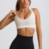 Αθλητικό σουτιέν Super Sculpt χωρίς ραφές με σταυρωτή πλάτη σε λευκό Αθλητικό σουτιέν Super Sculpt χωρίς ραφές με σταυρωτή πλάτη σε λευκό