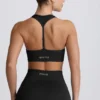 Αθλητικό σουτιέν Super Sculpt Seamless T-Back σε μαύρο χρώμα Αθλητικό σουτιέν Super Sculpt Seamless T-Back σε μαύρο χρώμα