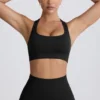 Αθλητικό σουτιέν Super Sculpt Seamless T-Back σε μαύρο χρώμα Αθλητικό σουτιέν Super Sculpt Seamless T-Back σε μαύρο χρώμα