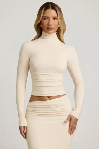 Auri Modal Ruched Backless Turtleneck Μπλούζα σε χρώμα ιβουάρ