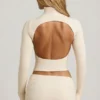 Auri Modal Ruched Backless Turtleneck Μπλούζα σε χρώμα ιβουάρ Auri Modal Ruched Backless Turtleneck Μπλούζα σε χρώμα ιβουάρ