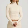 Auri Modal Ruched Backless Turtleneck Μπλούζα σε χρώμα ιβουάρ Auri Modal Ruched Backless Turtleneck Μπλούζα σε χρώμα ιβουάρ