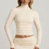 Auri Modal Ruched Backless Turtleneck Μπλούζα σε χρώμα ιβουάρ Auri Modal Ruched Backless Turtleneck Μπλούζα σε χρώμα ιβουάρ
