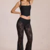 Calista Sheer Lace Mid-Rise Flared Trousers σε μαύρο Calista Sheer Lace Mid-Rise Flared Trousers σε μαύρο