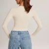 Elodie Modal Plunge Long-Sleeve Κορμάκι σε χρώμα Ivory Elodie Modal Plunge Long-Sleeve Κορμάκι σε χρώμα Ivory