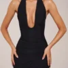 Φορέμα Storie με λαιμόκοψη και σχισμή στο τελείωμα, σε μαύρο χρώμα Φορέμα Storie με λαιμόκοψη και σχισμή στο τελείωμα, σε μαύρο χρώμα