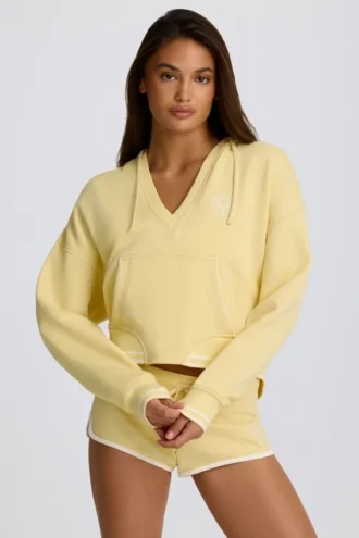 Φούτερ με κουκούλα και V-neck από βαμβακερό τζέρσεϊ σε χρώμα λεμόνι