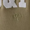 Φούτερ με κουκούλα σε χρώμα απαλό ελαιόλαδο Φούτερ με κουκούλα σε χρώμα απαλό ελαιόλαδο