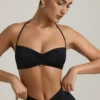 Jerika Slinky Jersey Μπραλέτα με λεπτομέρειες από μεταλλικά στοιχεία και λαιμόκοψη halter σε μαύρο Jerika Slinky Jersey Μπραλέτα με λεπτομέρειες από μεταλλικά στοιχεία και λαιμόκοψη halter σε μαύρο