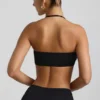 Jerika Slinky Jersey Μπραλέτα με λεπτομέρειες από μεταλλικά στοιχεία και λαιμόκοψη halter σε μαύρο Jerika Slinky Jersey Μπραλέτα με λεπτομέρειες από μεταλλικά στοιχεία και λαιμόκοψη halter σε μαύρο