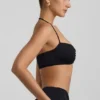 Jerika Slinky Jersey Μπραλέτα με λεπτομέρειες από μεταλλικά στοιχεία και λαιμόκοψη halter σε μαύρο Jerika Slinky Jersey Μπραλέτα με λεπτομέρειες από μεταλλικά στοιχεία και λαιμόκοψη halter σε μαύρο