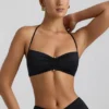 Jerika Slinky Jersey Μπραλέτα με λεπτομέρειες από μεταλλικά στοιχεία και λαιμόκοψη halter σε μαύρο Jerika Slinky Jersey Μπραλέτα με λεπτομέρειες από μεταλλικά στοιχεία και λαιμόκοψη halter σε μαύρο