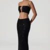 Κοντή μπλούζα Ariana με διακοσμητικά cut-out σε μαύρο χρώμα Κοντή μπλούζα Ariana με διακοσμητικά cut-out σε μαύρο χρώμα