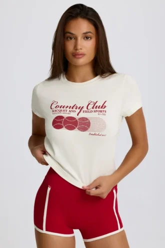 Κοντό T-shirt με γραφικό σχέδιο σε χρώμα ιβουάρ