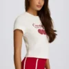 Κοντό T-shirt με γραφικό σχέδιο σε χρώμα ιβουάρ Κοντό T-shirt με γραφικό σχέδιο σε χρώμα ιβουάρ