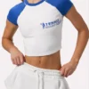 Κοντό T-shirt με γραφικό σχέδιο σε λευκό χρώμα Κοντό T-shirt με γραφικό σχέδιο σε λευκό χρώμα