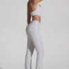 Λευκή ολόσωμη φόρμα Coralena με διακοσμητικά cut-out Λευκή ολόσωμη φόρμα Coralena με διακοσμητικά cut-out