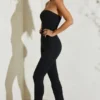 Μαύρη ολόσωμη φόρμα Jamila με στράπλες και φαρδιά ποδιά Μαύρη ολόσωμη φόρμα Jamila με στράπλες και φαρδιά ποδιά