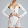 Melody Embellished Cut-Out Unitard σε χρώμα ιβουάρ Melody Embellished Cut-Out Unitard σε χρώμα ιβουάρ