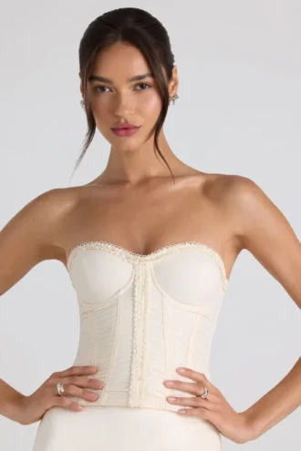 Melvina Ruched Lace-Up Strapless Corset Μπλούζα σε χρώμα ιβουάρ