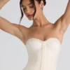 Melvina Ruched Lace-Up Strapless Corset Μπλούζα σε χρώμα ιβουάρ Melvina Ruched Lace-Up Strapless Corset Μπλούζα σε χρώμα ιβουάρ