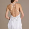 Μίνι φόρεμα Mariette από σιφόν με βαθύ ντεκολτέ και ανοιχτή πλάτη σε λευκό Μίνι φόρεμα Mariette από σιφόν με βαθύ ντεκολτέ και ανοιχτή πλάτη σε λευκό