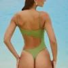 Ολόσωμο Μαγιό Formentera με διακοσμητικά cut-out σε χρώμα λαδί Ολόσωμο Μαγιό Formentera με διακοσμητικά cut-out σε χρώμα λαδί