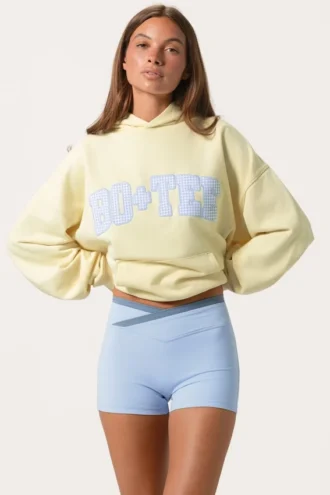 Oversized φούτερ με κουκούλα και απλικέ σε χρώμα λεμόνι