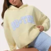 Oversized φούτερ με κουκούλα και απλικέ σε χρώμα λεμόνι Oversized φούτερ με κουκούλα και απλικέ σε χρώμα λεμόνι