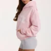 Oversized φούτερ με κουκούλα και απλικέ σε ροζ χρώμα Oversized φούτερ με κουκούλα και απλικέ σε ροζ χρώμα