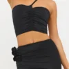Tesia Slinky Jersey Rose Detail Asymmetric Μπλούζα σε μαύρο Tesia Slinky Jersey Rose Detail Asymmetric Μπλούζα σε μαύρο